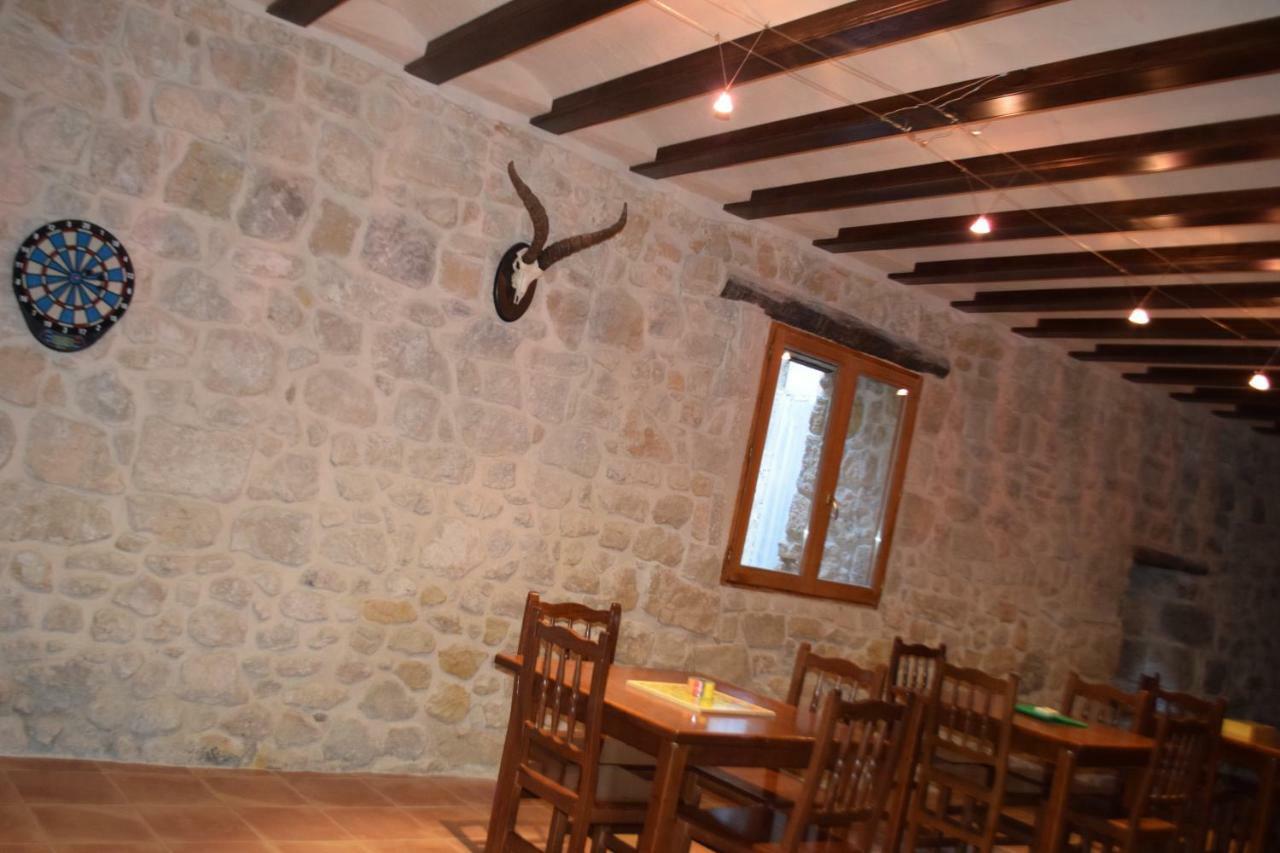 Apartamentos La Muralla Horta de Sant Joan Esterno foto